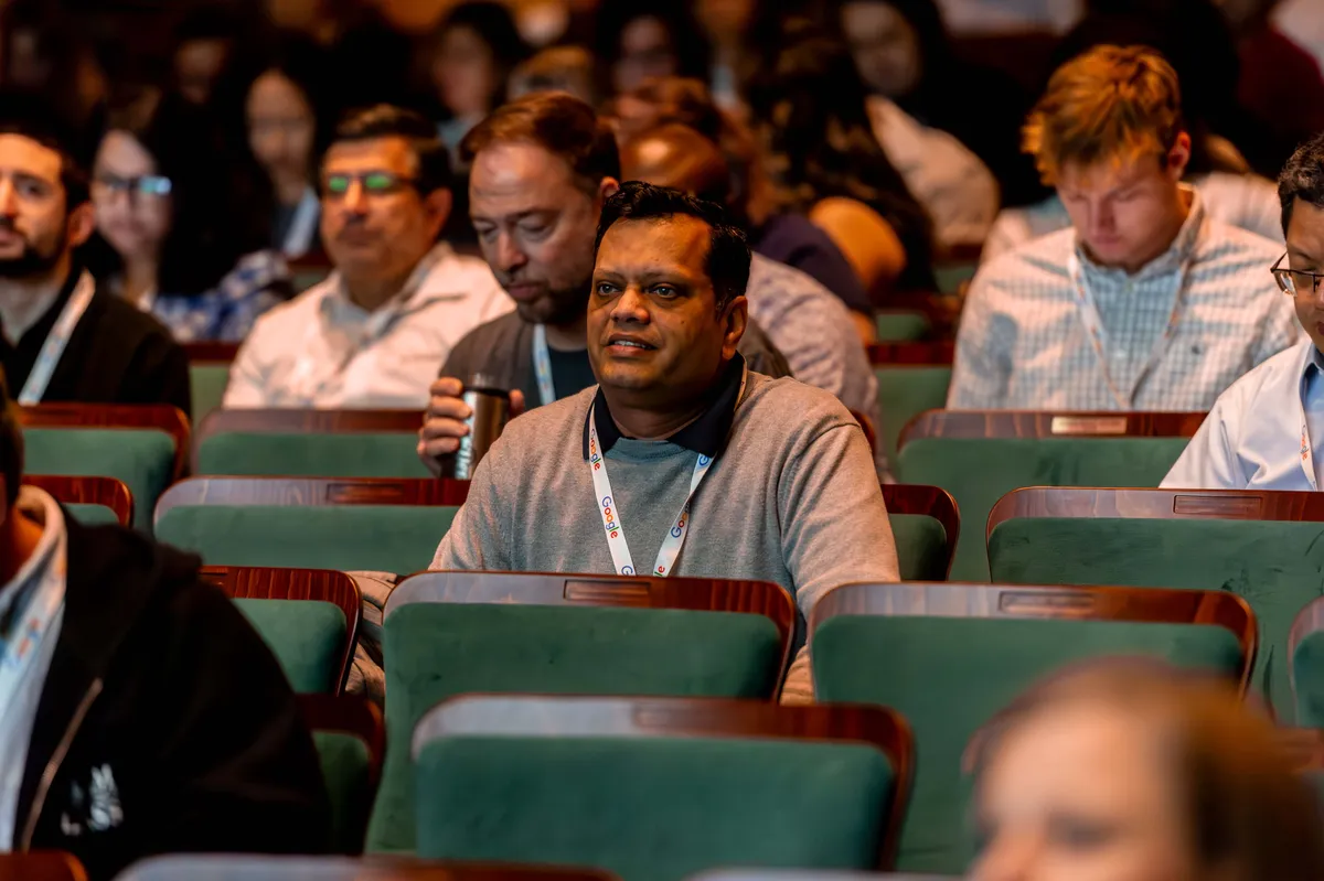 Business professionals following along during a hands-on session at All Things AI 2026