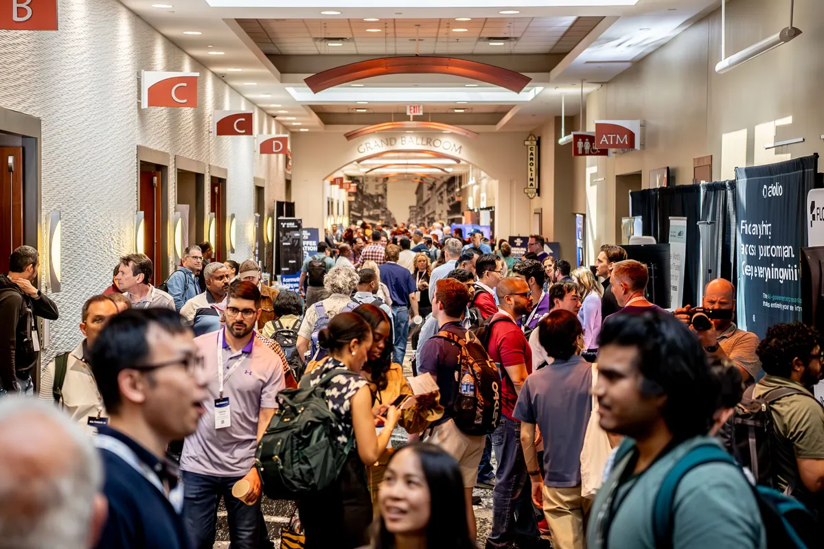 Attendees networking at All Things AI 2026